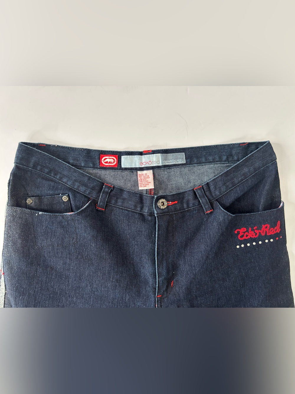 Ecko Unlimited Dark Blue Slim Jeans with Red Accent Stitching